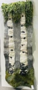 Birch Trees by Christine Tallberg This hand-felted piece, created by Christine Tallberg, is made from sheep wool, silk, and linen, and depicts two birch trees.